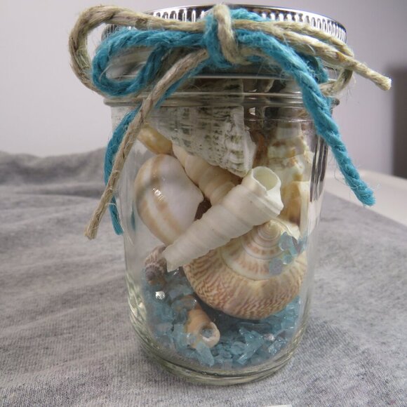 Jar of REAL sea shells with blue sparkly vase filler at bottom - Picture 1 of 8